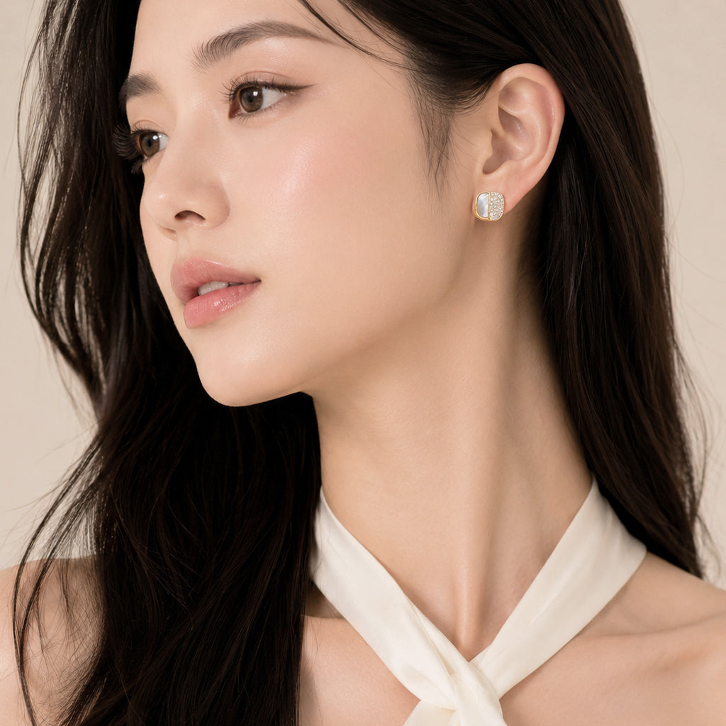 Gold plated squarish mother of pearl earrings with cubic zirconia studs on hypoallergenic posts