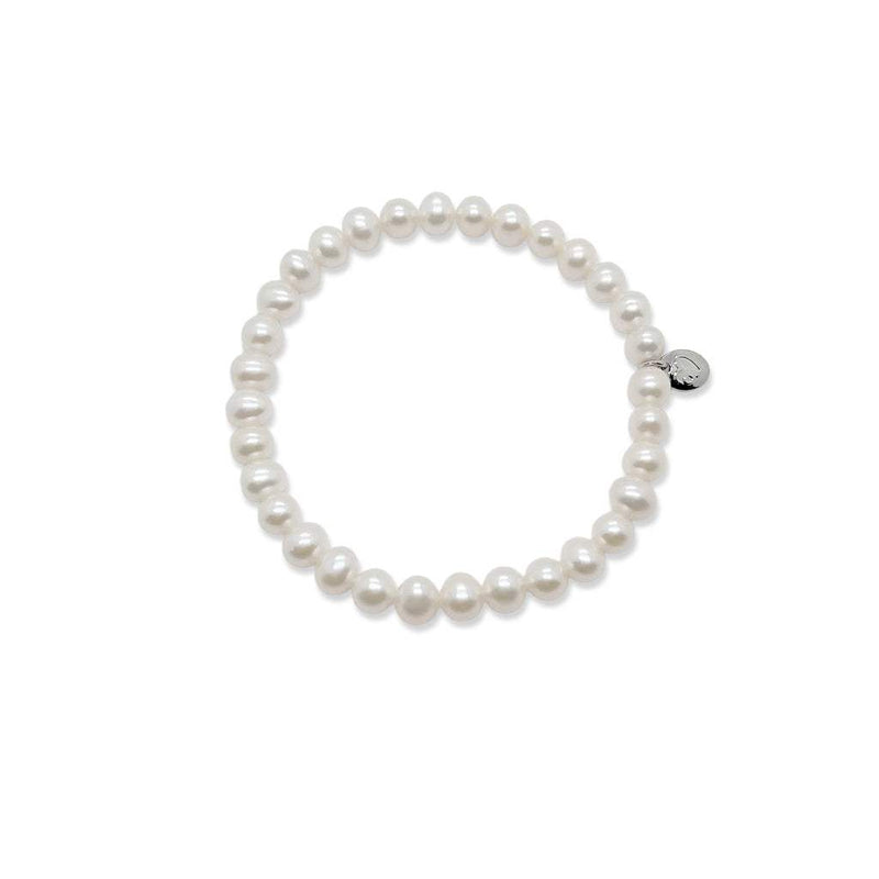 Freshwater Pearl Bracelet with 6-7mm roundish pearls on elastic band for easy wear, classic style.
