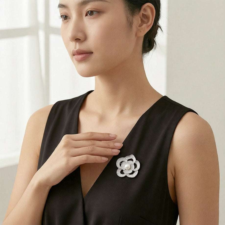 Flower freshwater pearl brooch with cubic zirconia petals and rhodium plating