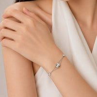 Tunnel cubic zirconia bracelet with rhodium plating and adjustable spring clasp