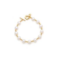 Freshwater Pearl Bracelet with lustrous white round pearls, gold spacer beads and a decorative gold toggle clasp.