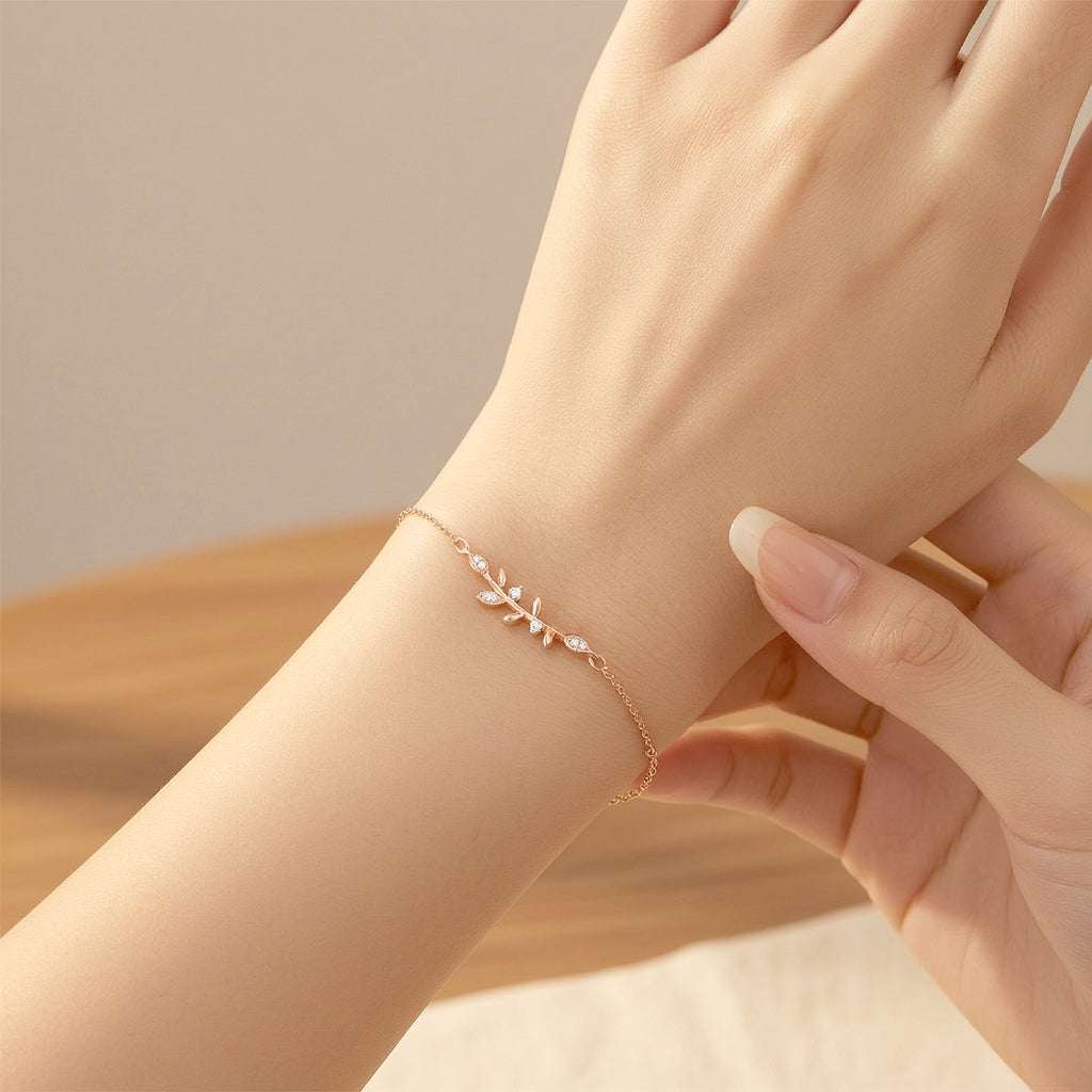 Rosegold plated leaf cubic zirconia bracelet with adjustable length and elegant leaf design