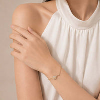 Rosegold Planet Cubic Zirconia bracelet with adjustable chain and cz drop charm