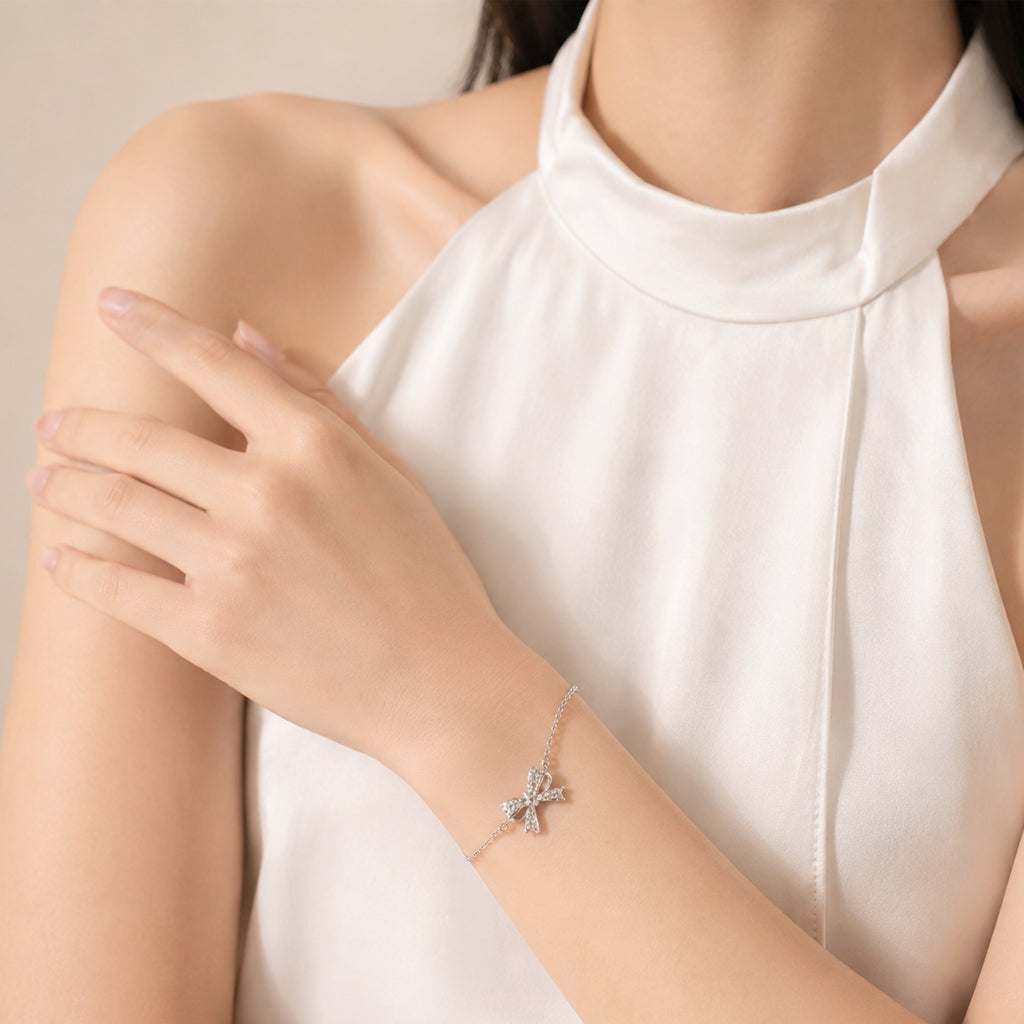 Ribbon cubic zirconia bracelet with rhodium plating and adjustable spring clasp