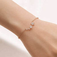 Rosegold Star Cubic Zirconia Bracelet with adjustable chain and sparkling 4-star design