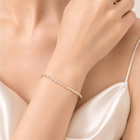 Rose gold cubic zirconia tennis bracelet with 2mm round stones, 16cm length, elegant jewelry accessory