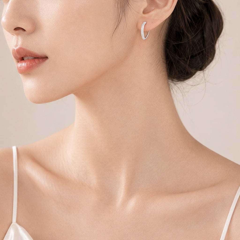 Heart cubic zirconia hoop earrings with rhodium plating and hinged clasps, 1.5cm x 1.2cm size