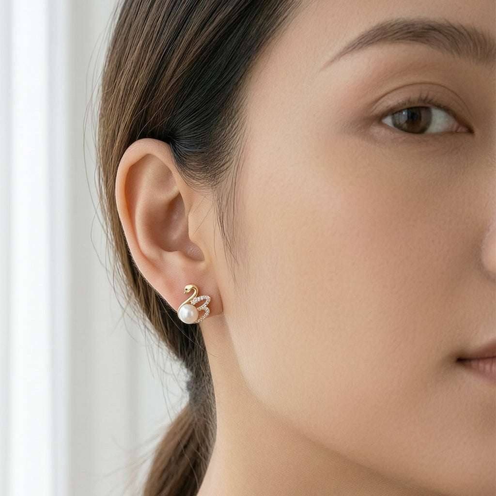 Freshwater pearl and cubic zirconia gold plated stud earrings with post backings