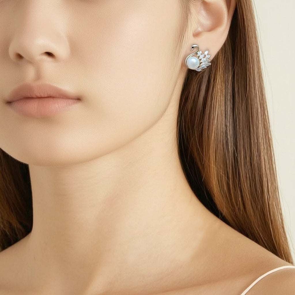Gold plated freshwater pearl and cubic zirconia swan stud earrings 14x13mm