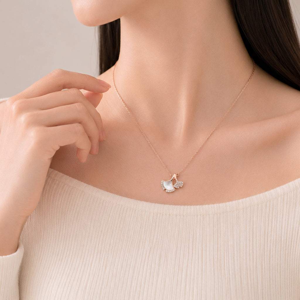 Ginkgo leaf necklace with mother of pearl pendant and rosegold plated chain