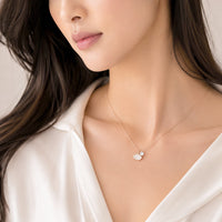 Rose gold Ginkgo leaf cubic zirconia necklace with solitaire stone pendant on adjustable chain