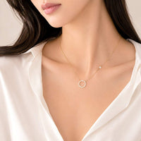 Round Cubic Zirconia Necklace with rosegold plated chain and 1.2 cm round pendant featuring 3mm cubic zirconia stone
