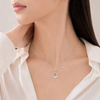 Round mother of pearl pendant necklace with rhodium plating and adjustable chain