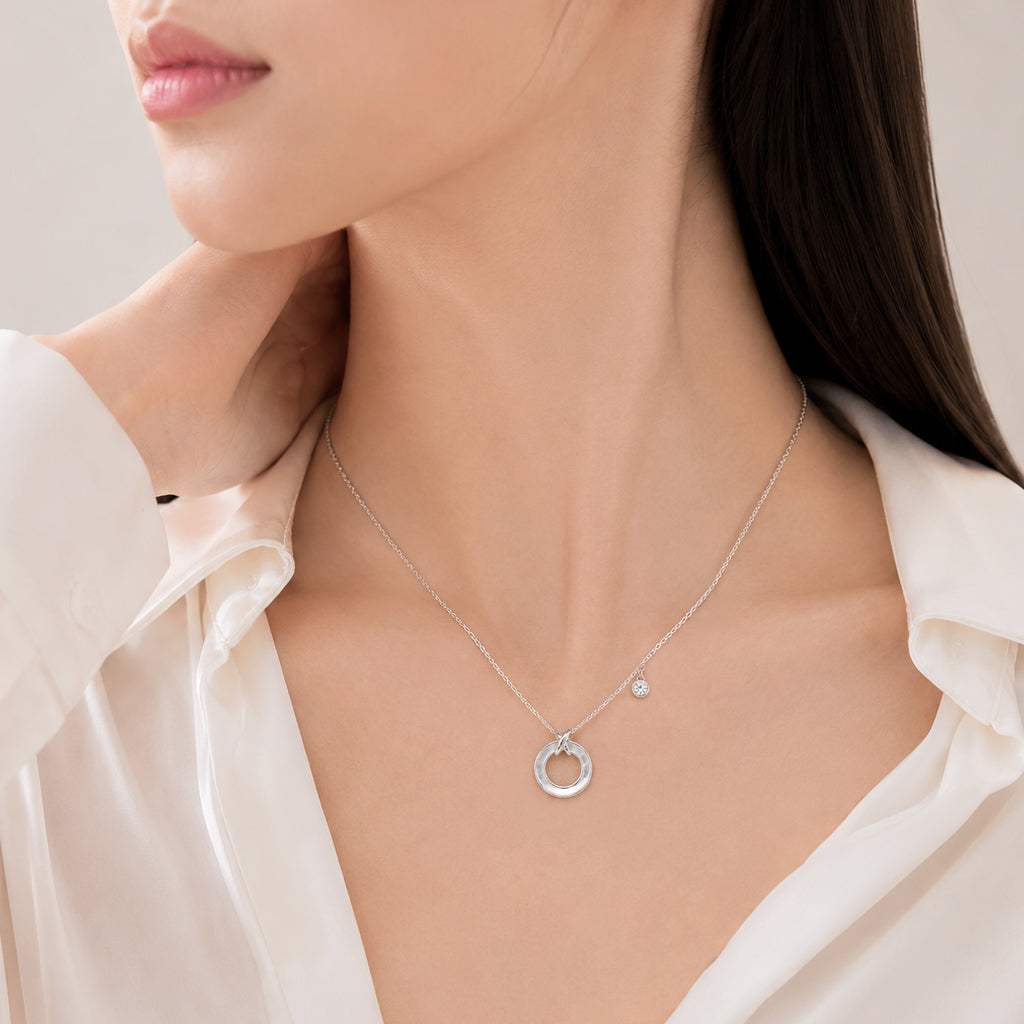Round mother of pearl pendant necklace with rhodium plating and adjustable chain