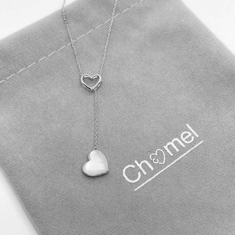 CHOMEL Mother of Pearl Dangling Heart Rhodium Necklace.  