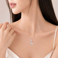 Butterfly mother of pearl pendant necklace with cubic zirconia stone on adjustable rhodium plated chain