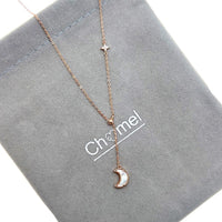 Mother of Pearl moon drop pendant with cubic zirconia star on adjustable rosegold chain