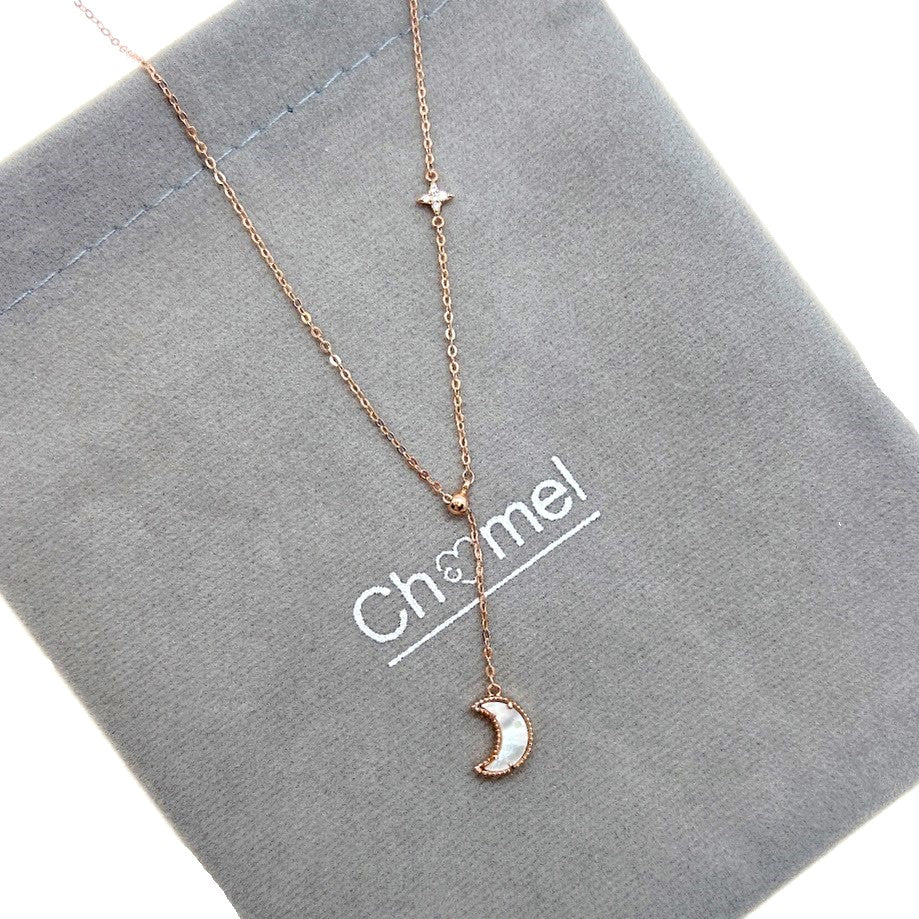 Mother of Pearl moon drop pendant with cubic zirconia star on adjustable rosegold chain