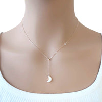 Mother of Pearl moon drop pendant with cubic zirconia star on rosegold chain