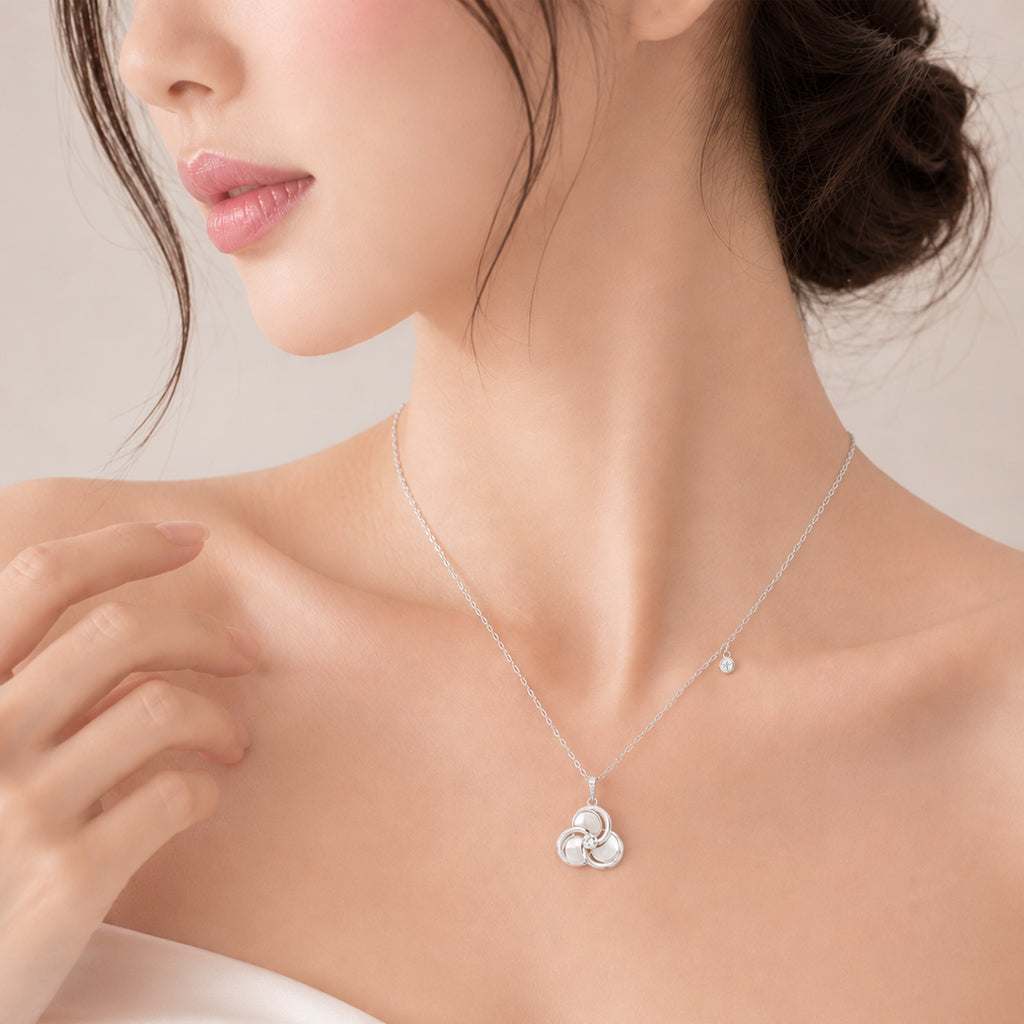 Flower Mother of Pearl Necklace with cubic zirconia drop and rhodium plated adjustable chain