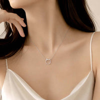 Ribbon cubic zirconia necklace with rhodium plated star pendant on adjustable chain