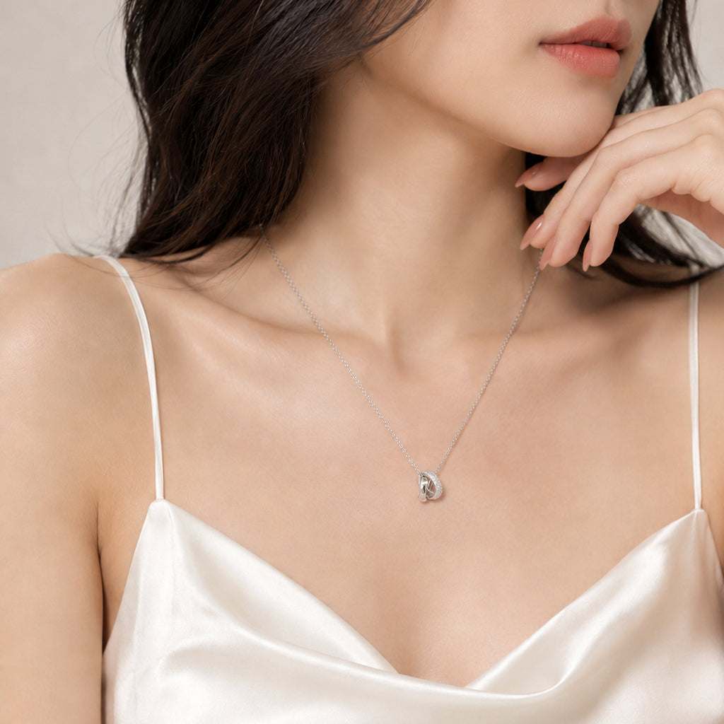Interlocking Ring Cubic Zirconia Necklace with rhodium plating and adjustable chain