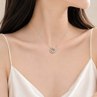 Interlocking cubic zirconia necklace with three sparkling rings on rhodium plated chain