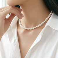 Freshwater pearl necklace with flower rhodium clasp and hand-knotted 6-7mm pearls, 15.5 inches long