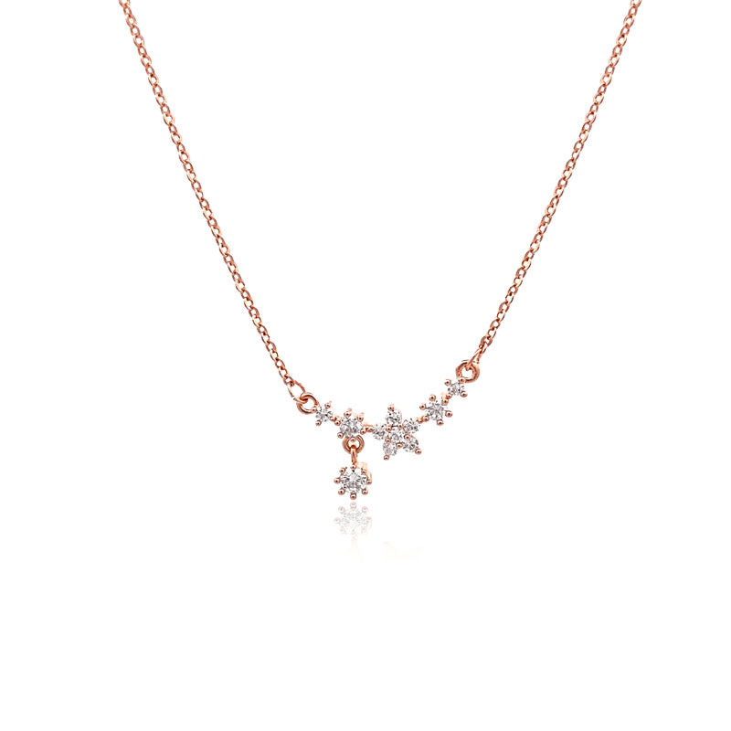CHOMEL Cubic Zirconia Star and Flower Rosegold Necklace
