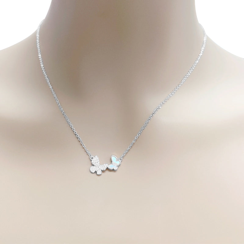 CHOMEL Cubic Zirconia and Mother of Pearl Butterfly Rhodium necklace.