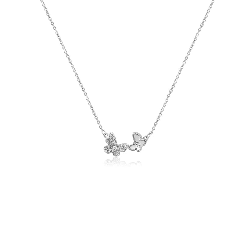 CHOMEL Cubic Zirconia and Mother of Pearl Butterfly Rhodium necklace.