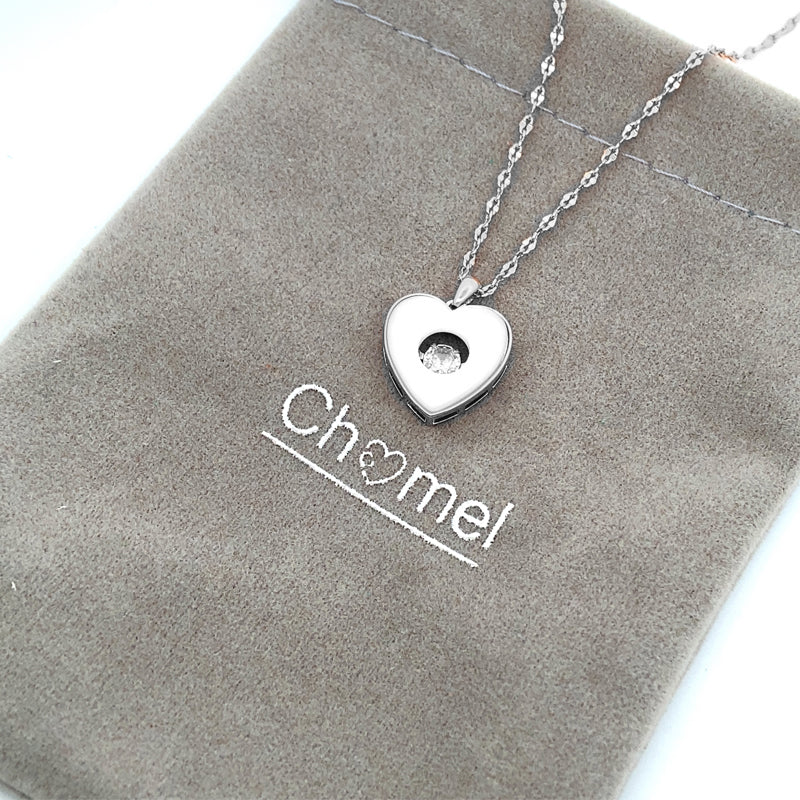 CHOMEL Cubic Zirconia and Mother of Pearl Heart Rhodium Necklace.