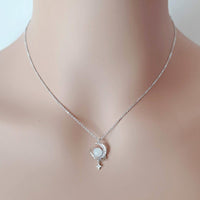 CHOMEL Cubic Zirconia Moon Planet Rhodium Necklace