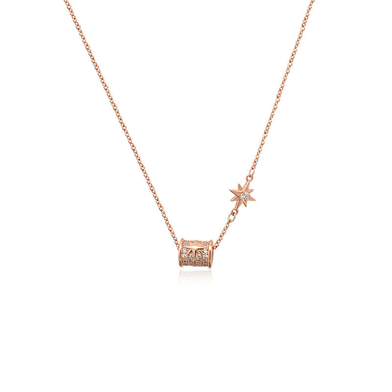 CHOMEL Cubic Zirconia Tunnel and Starburst Rosegold Necklace.
