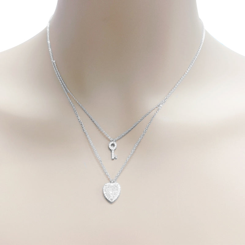 CHOMEL Cubic Zirconia Heart and Key Rhodium Necklace.