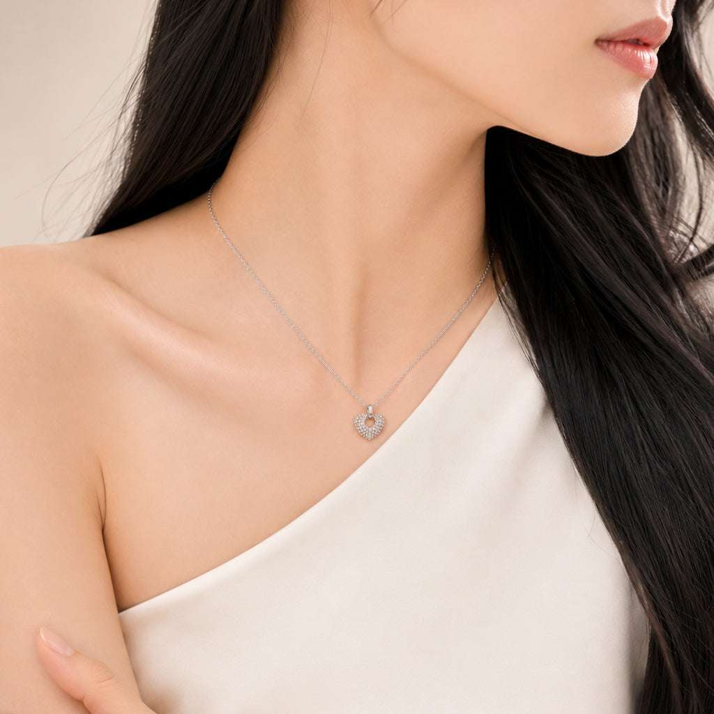 Heart Cubic Zirconia Necklace with rhodium plated heart-shaped pendant and sparkling stones on silver chain