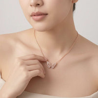 Delicate butterfly cubic zirconia pendant on rosegold chain necklace with spring clasp.