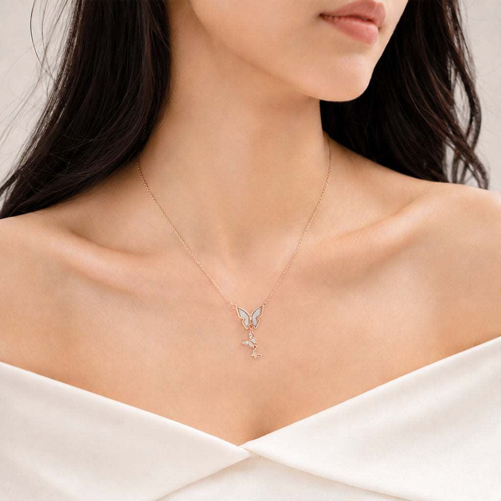 Rose gold Butterfly Mother of Pearl Necklace with triple cubic zirconia butterfly pendants on adjustable chain