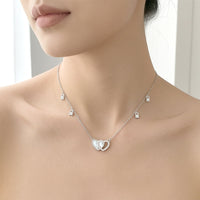 Double heart cubic zirconia and mother of pearl necklace with rhodium-plated chain