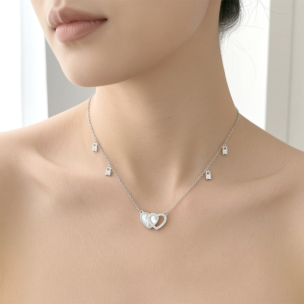 Double heart cubic zirconia and mother of pearl necklace with rhodium-plated chain