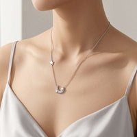 Moon and Star Cubic Zirconia Necklace with rhodium plating and adjustable chain
