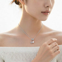 Cubic Zirconia butterfly pendant necklace with star charm and adjustable slider rings on rhodium plated chain