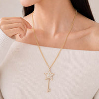 Rose gold key simulated pearl necklace with star pendant and cubic zirconia on double long chain