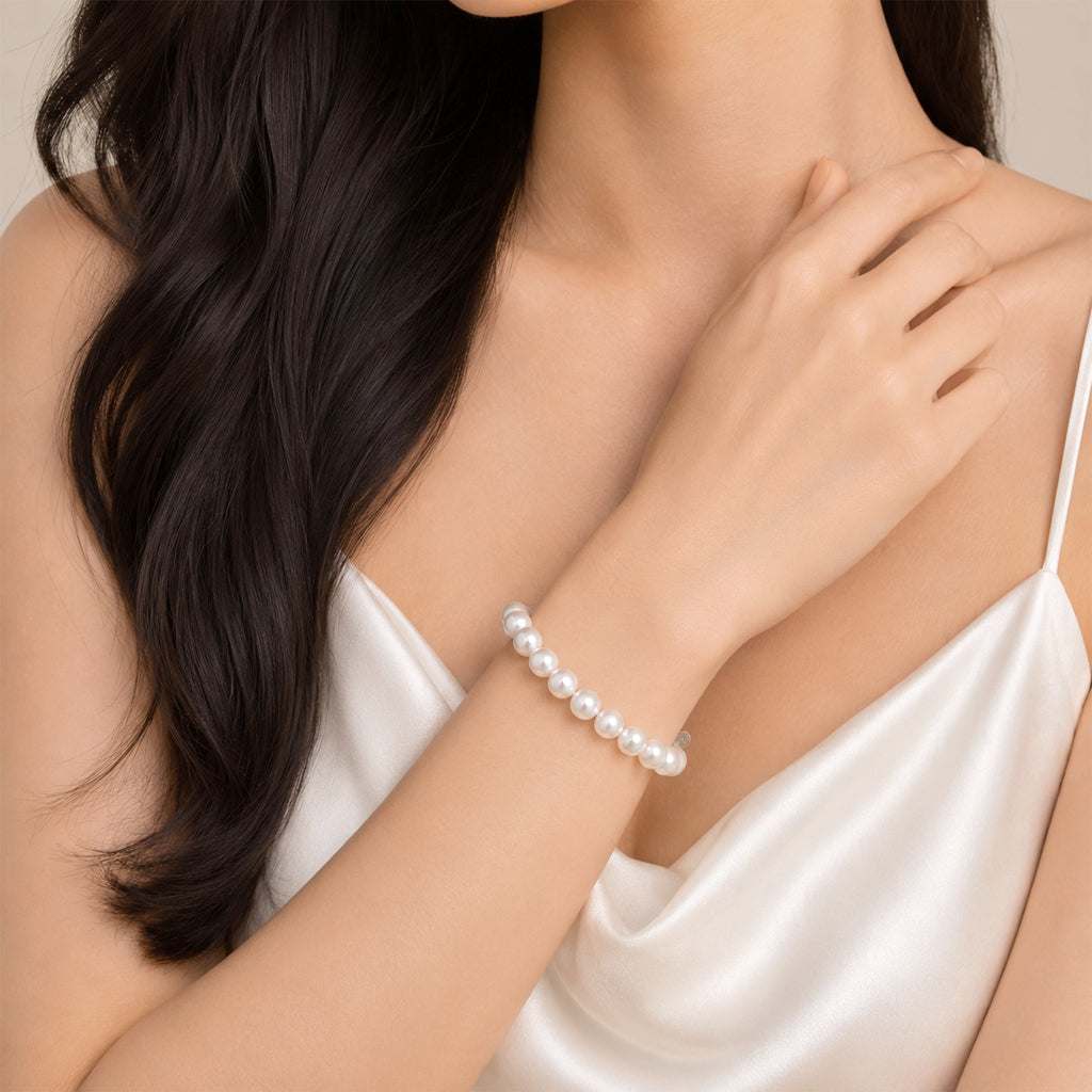 Simulated pearl elastic bracelet with 8mm pearls on a stretchable band for elegant and comfortable wear