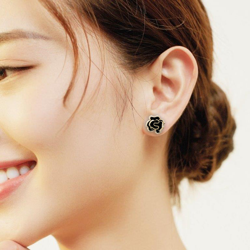 Cz flower hotsell stud earrings