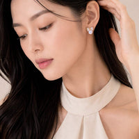 Gold plated ribbon simulated moonstone earrings with cubic zirconia accents and hypoallergenic posts