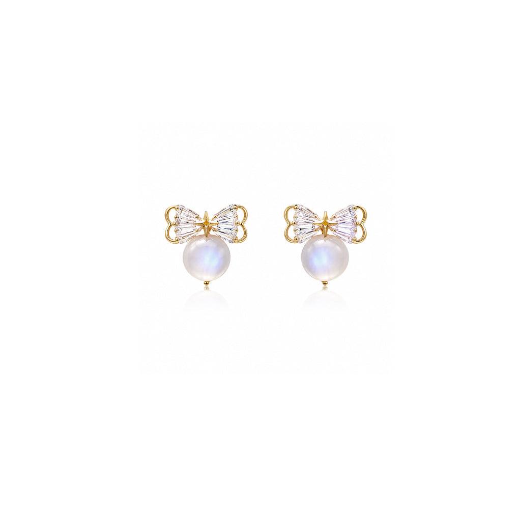Ribbon simulated moonstone earrings with cubic zirconia accents and gold plated finish