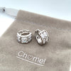 CHOMEL Cubic Zirconia Rhodium Hoop Earrings.