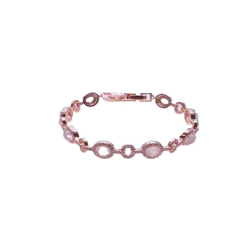 Cubic zirconia tennis bracelet with rosegold plated finish and oval moonstone accents