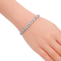 Cubic Zirconia Tennis Bracelet with sparkling baguette-cut stones and a polished rhodium-plated finish
